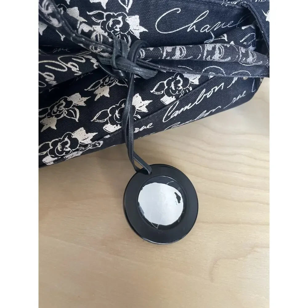 Chanel Graffiti Tote CC Print Camellia Drawstring Bag Black Cambon Mademoiselle